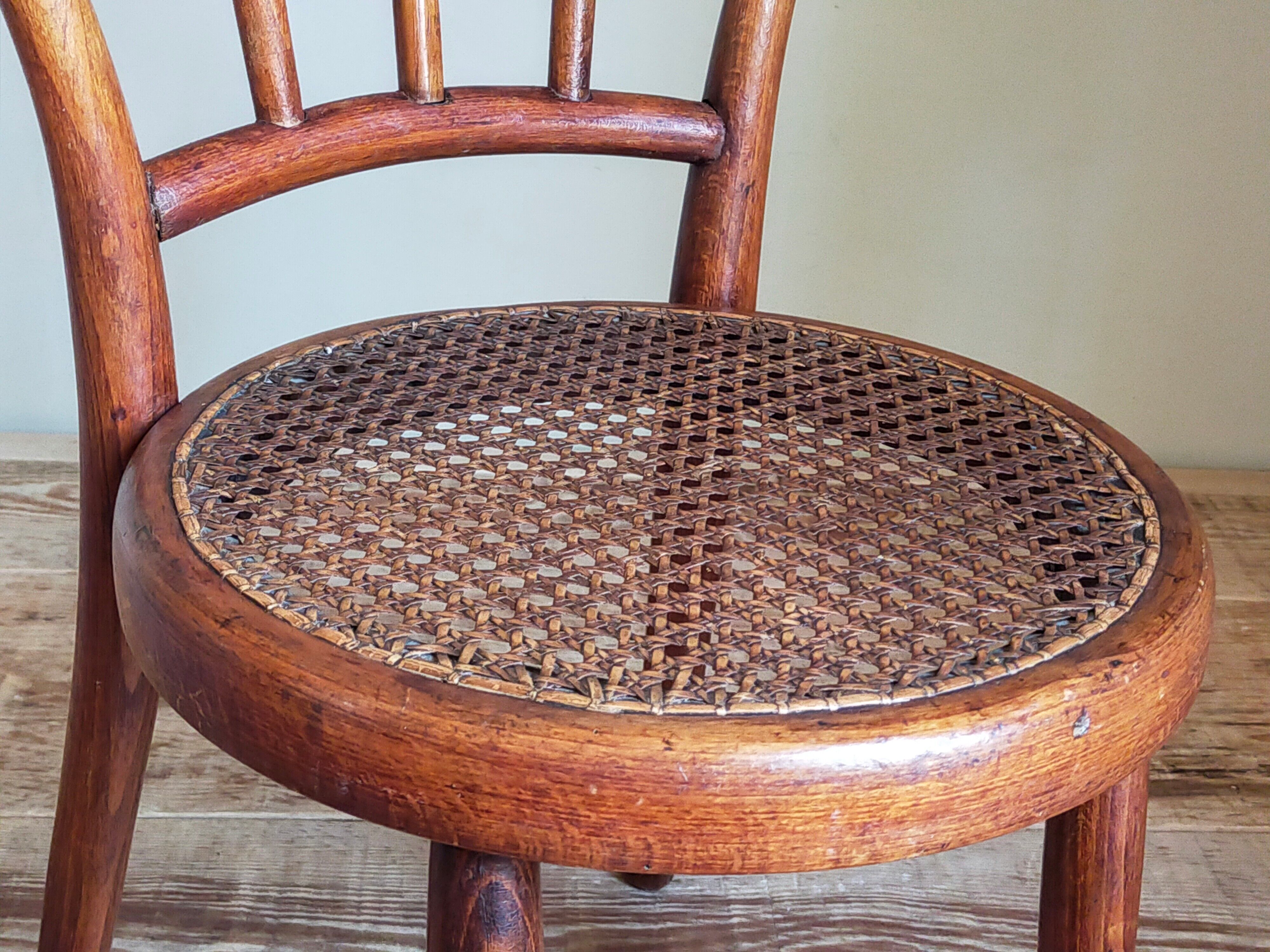 Children's chair in curved round wood old year