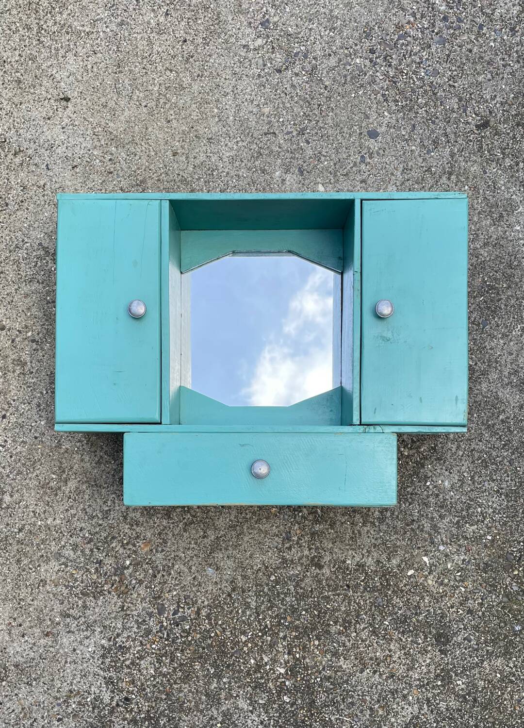 Old wall-mounted bathroom cabinet