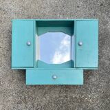 Old wall-mounted bathroom cabinet