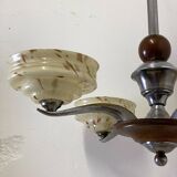Art Deco chandelier in wood, chrome metal, and glass.