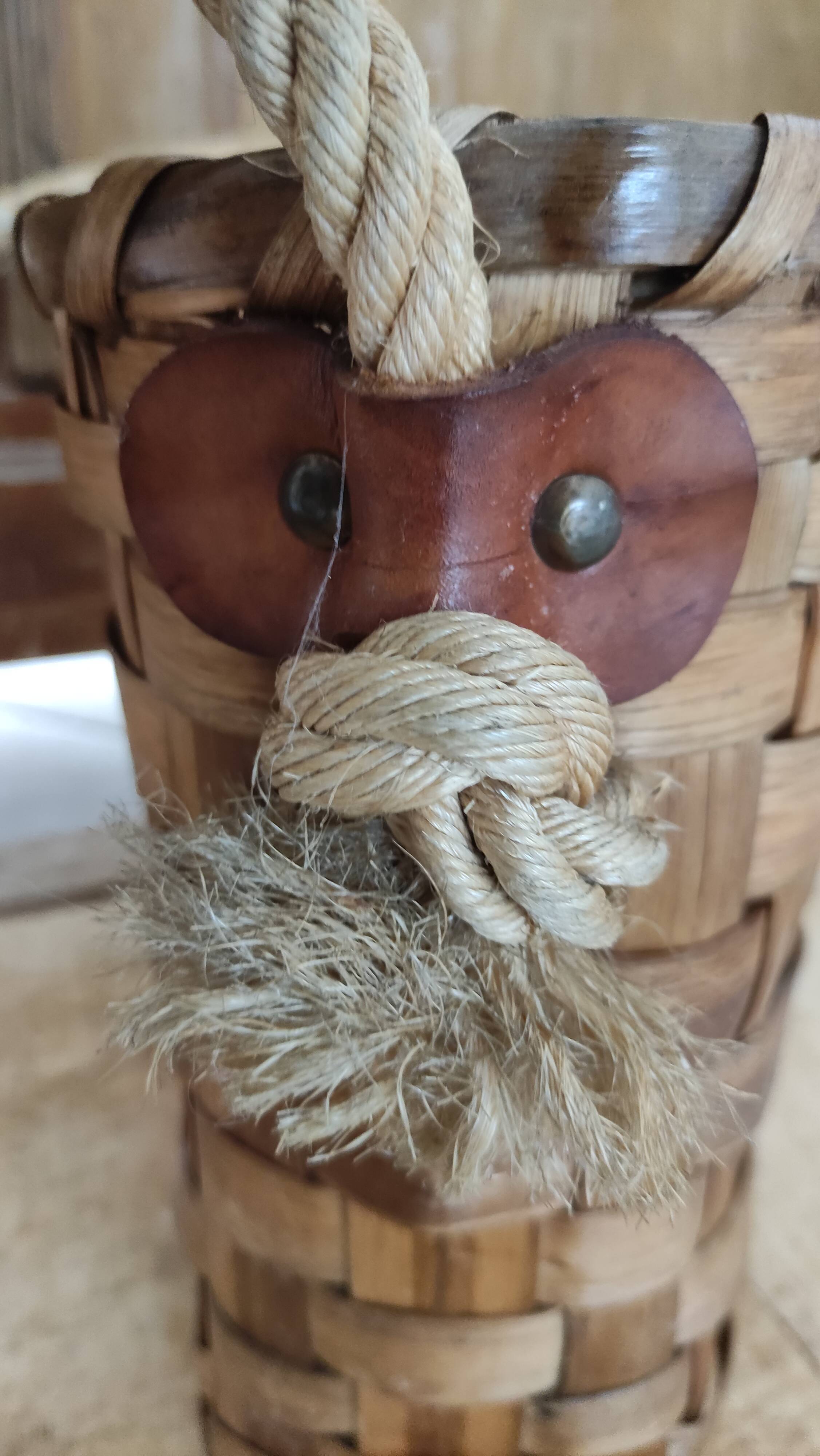 Basket or bag to put or hang leather, rope, brass and rattan