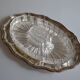 Silver-plated metal aperitif serving tray with HKE hallmark and glass.