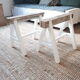 Industrial coffee table with trestles