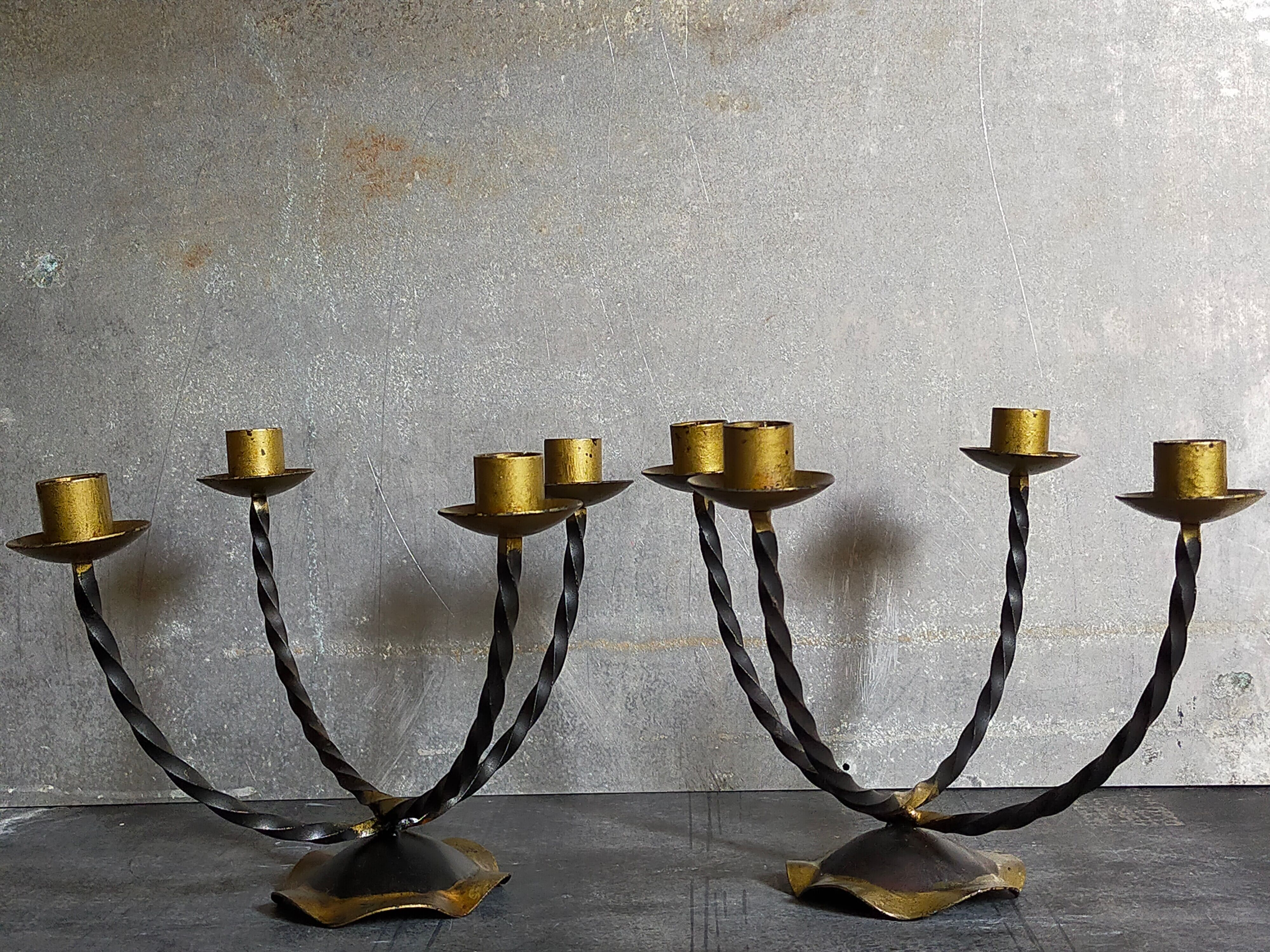 Pair of wrought iron candle holders four arms 50s