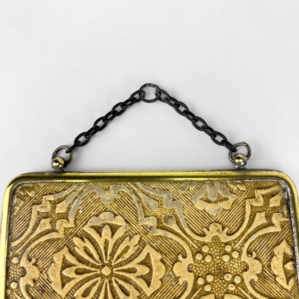 Old barber mirror in brass and beveled glass
