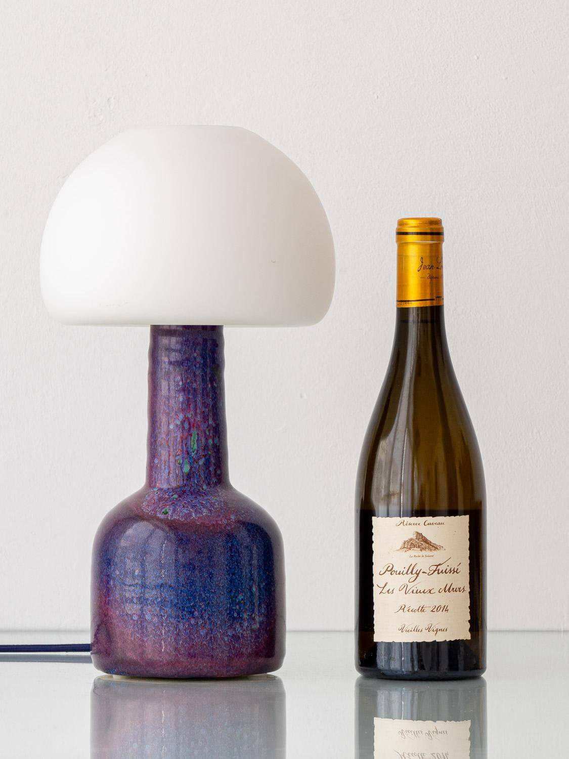 Mid-century modern table lamp by Jaap Ravelli, ceramic base and glass shade.