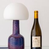 Mid-century modern table lamp by Jaap Ravelli, ceramic base and glass shade.
