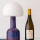 Mid-century modern table lamp by Jaap Ravelli, ceramic base and glass shade.