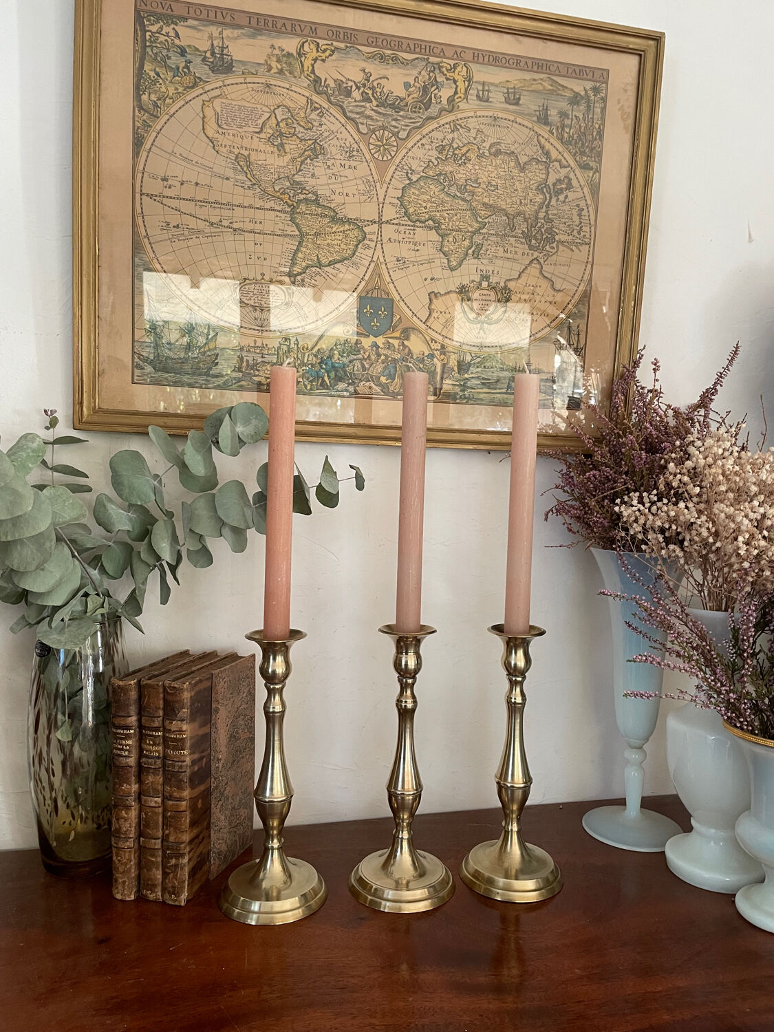 Set of three vintage brass candlesticks