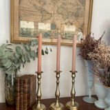 Set of three vintage brass candlesticks
