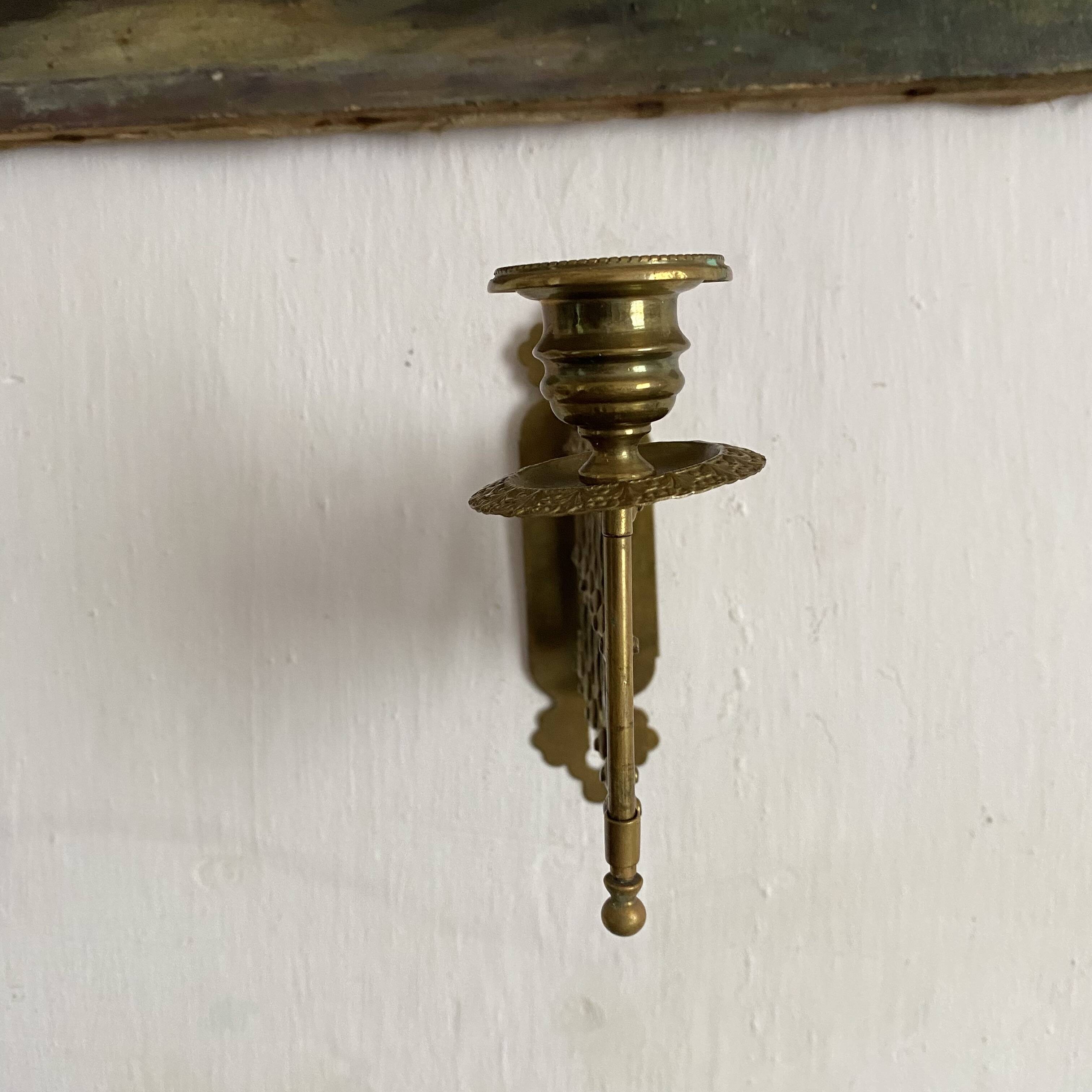 Antique extendable brass wall sconce