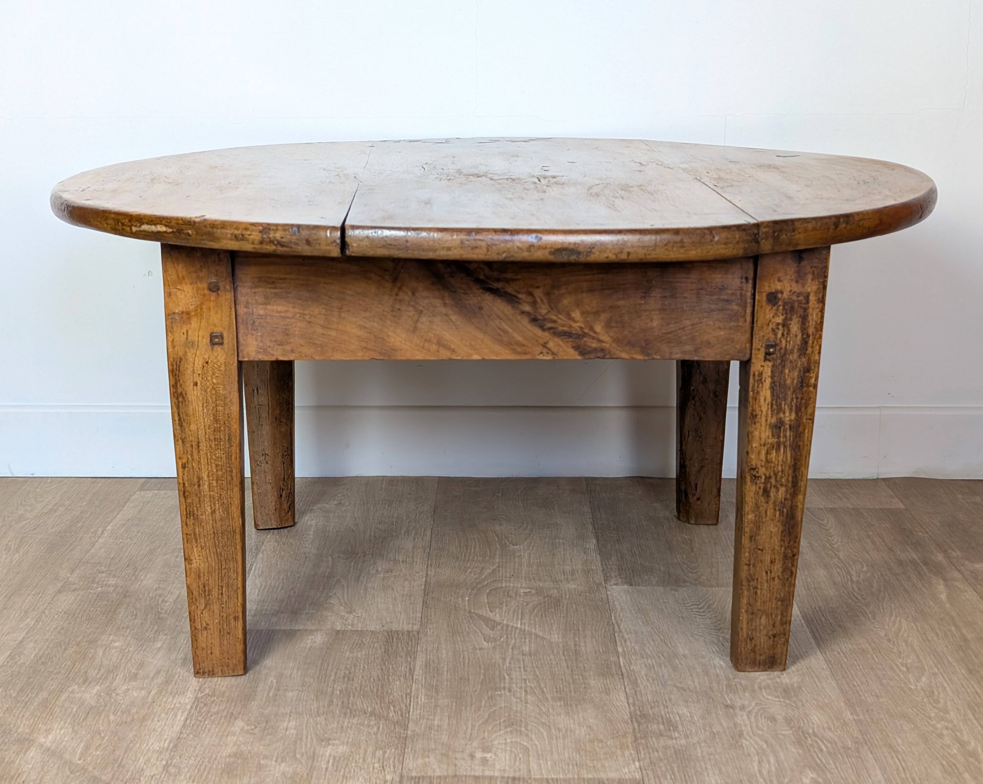 Round walnut coffee table