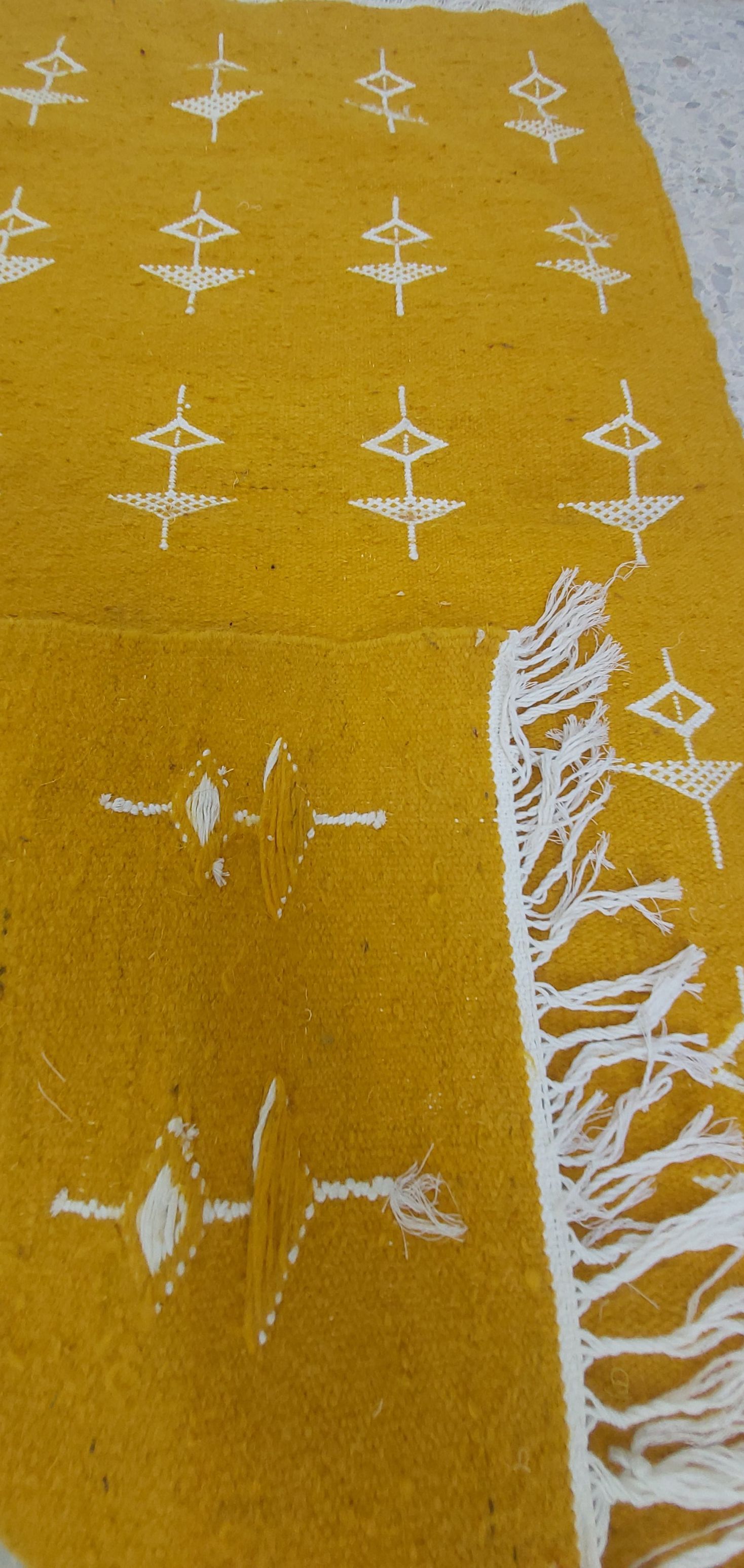 Traditional handmade berber yellow and white Berber kilim carpet made of pure wool