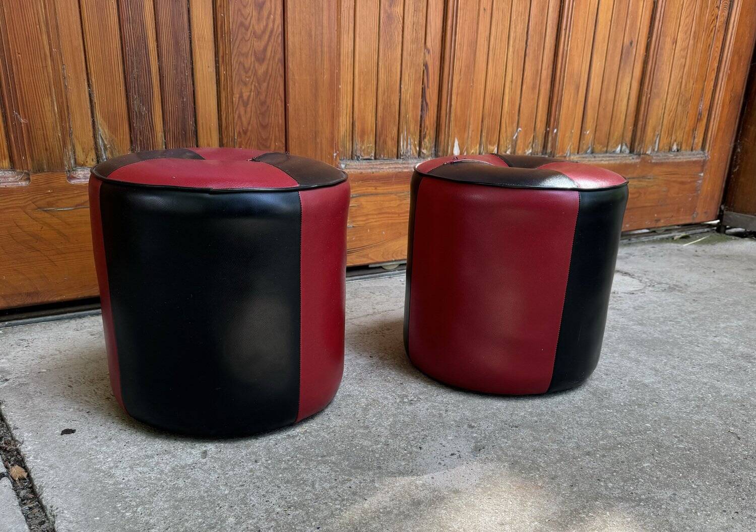 Set of 2 Mid-Century bordeaux and black ottomans in faux leather (upholstery fabric) - 1950s