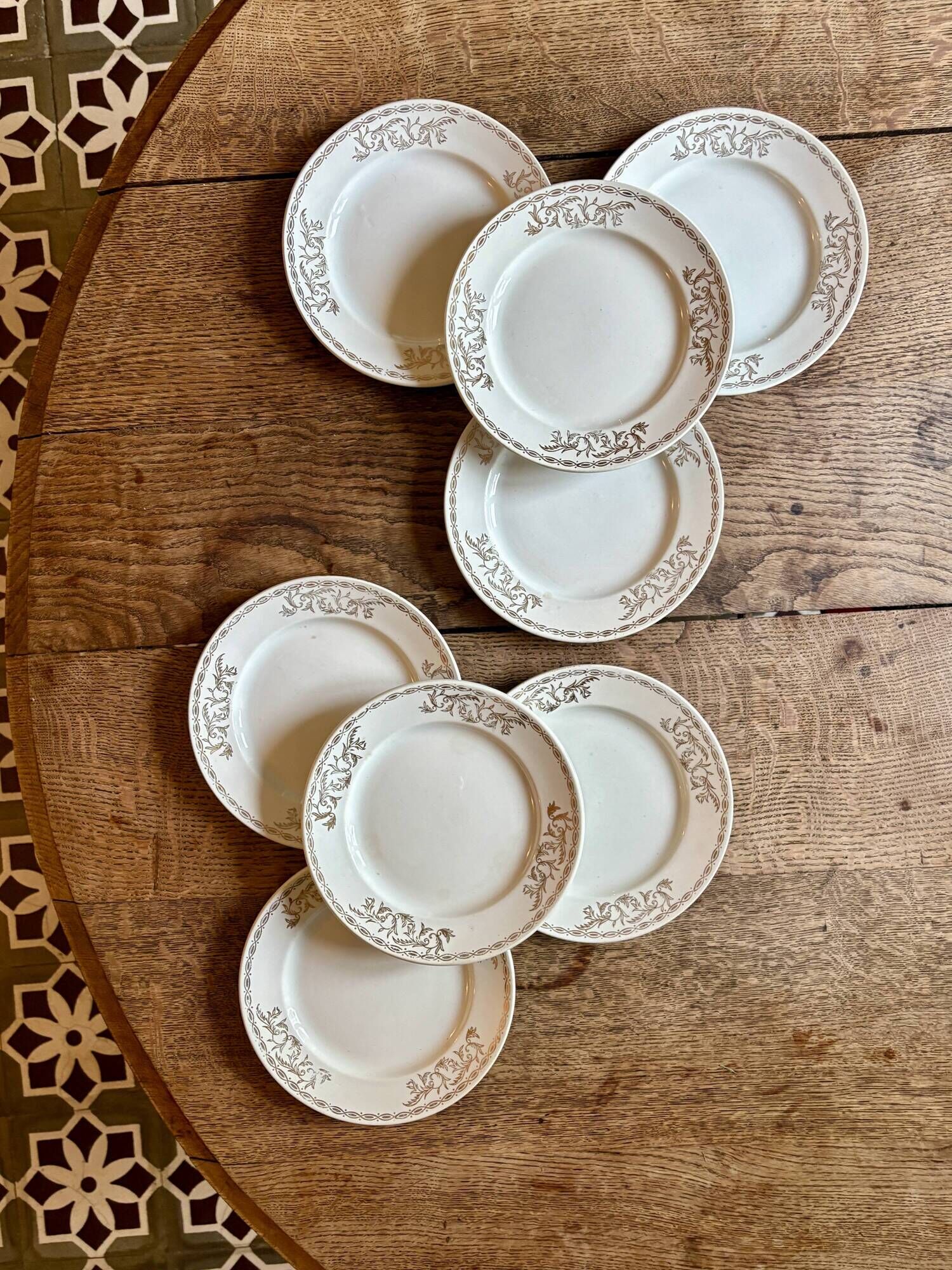 Set of 8 vintage white and gold dessert plates.
