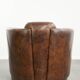Cowhide armchair in Aviator design in a warm brown colour