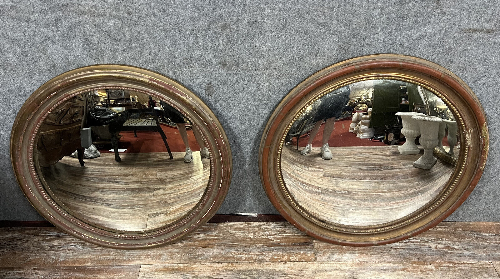 Pair of mirrors called "witch's eye" with patinated golden frame style Napoleon III