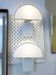 Pair of "Olympe" wall lights by Guzzini, 1970