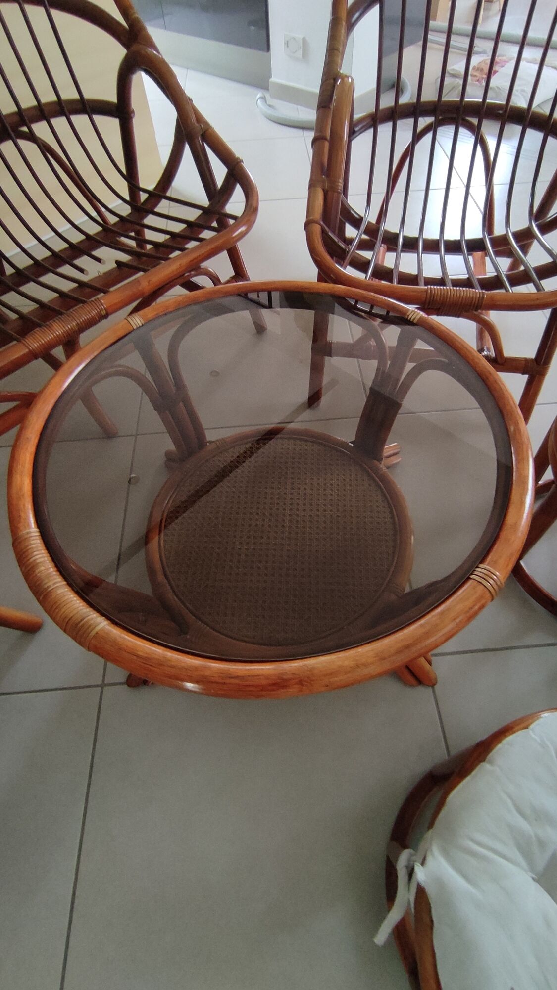 Sofa armchairs and coffee table in vintage rattan of six pieces
