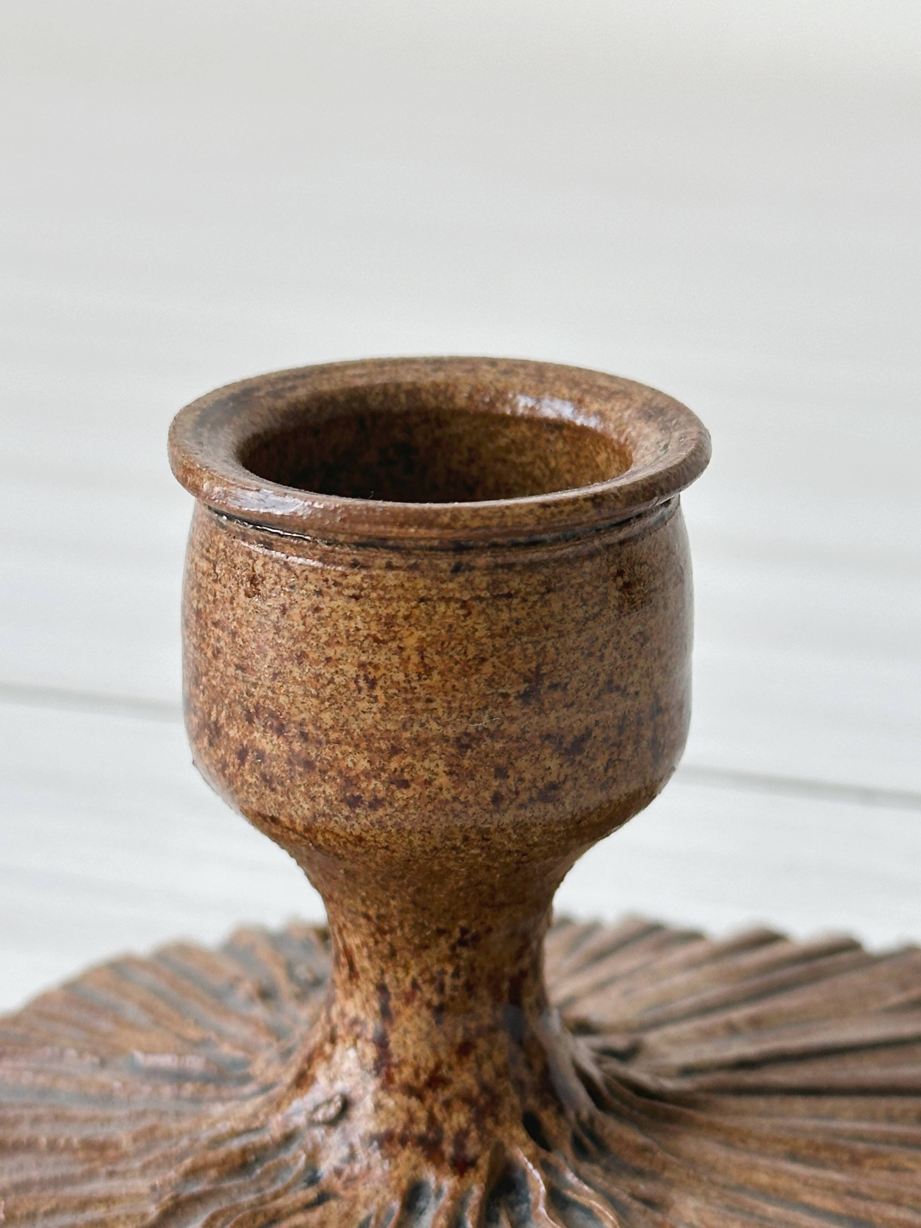 Atypical brown ceramic candle holder