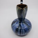 Blue ceramic pitcher