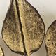 Pair of golden foliage wall lights circa 1960