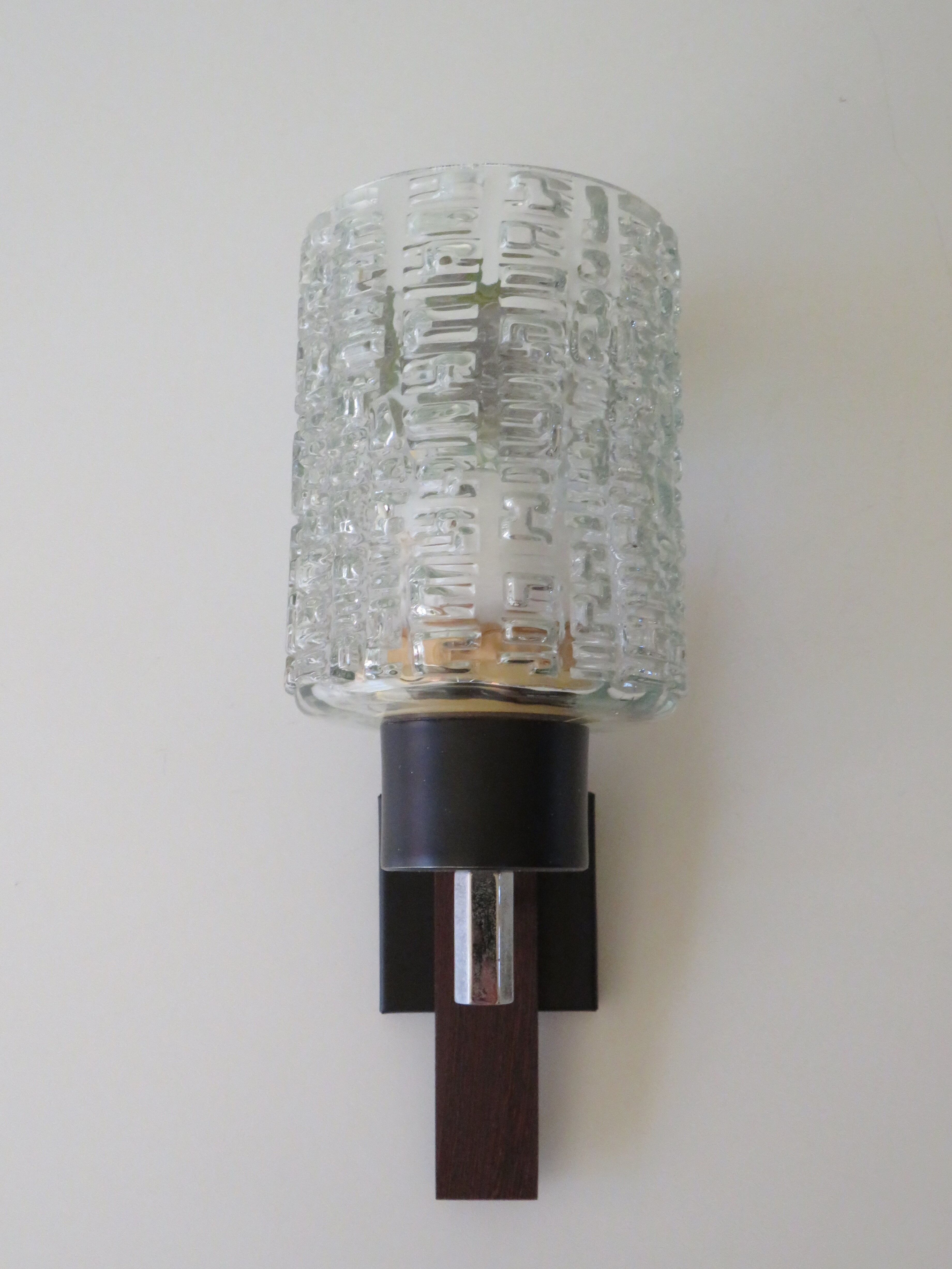 Vintage wall lamp in teak and glass relief Belgium 1970