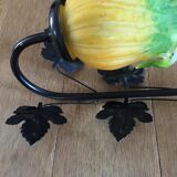Art-deco style wall lamp with black metal support and foliage and glass paste tulip