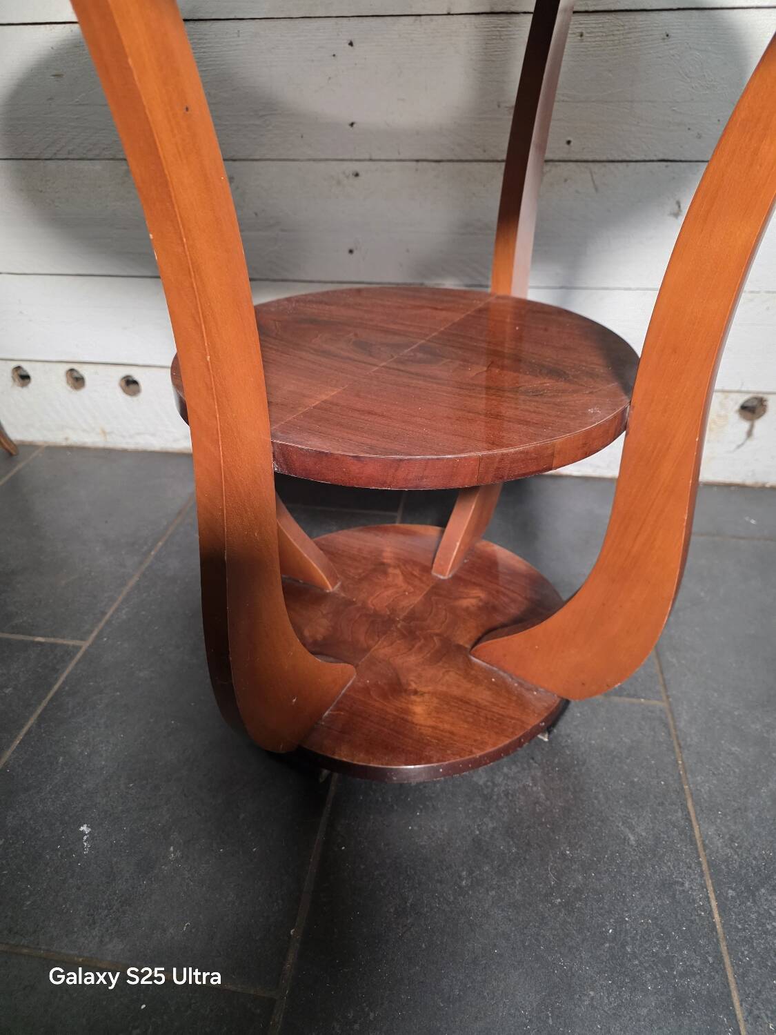 Art Deco walnut gueridon with double top from the 1930s.