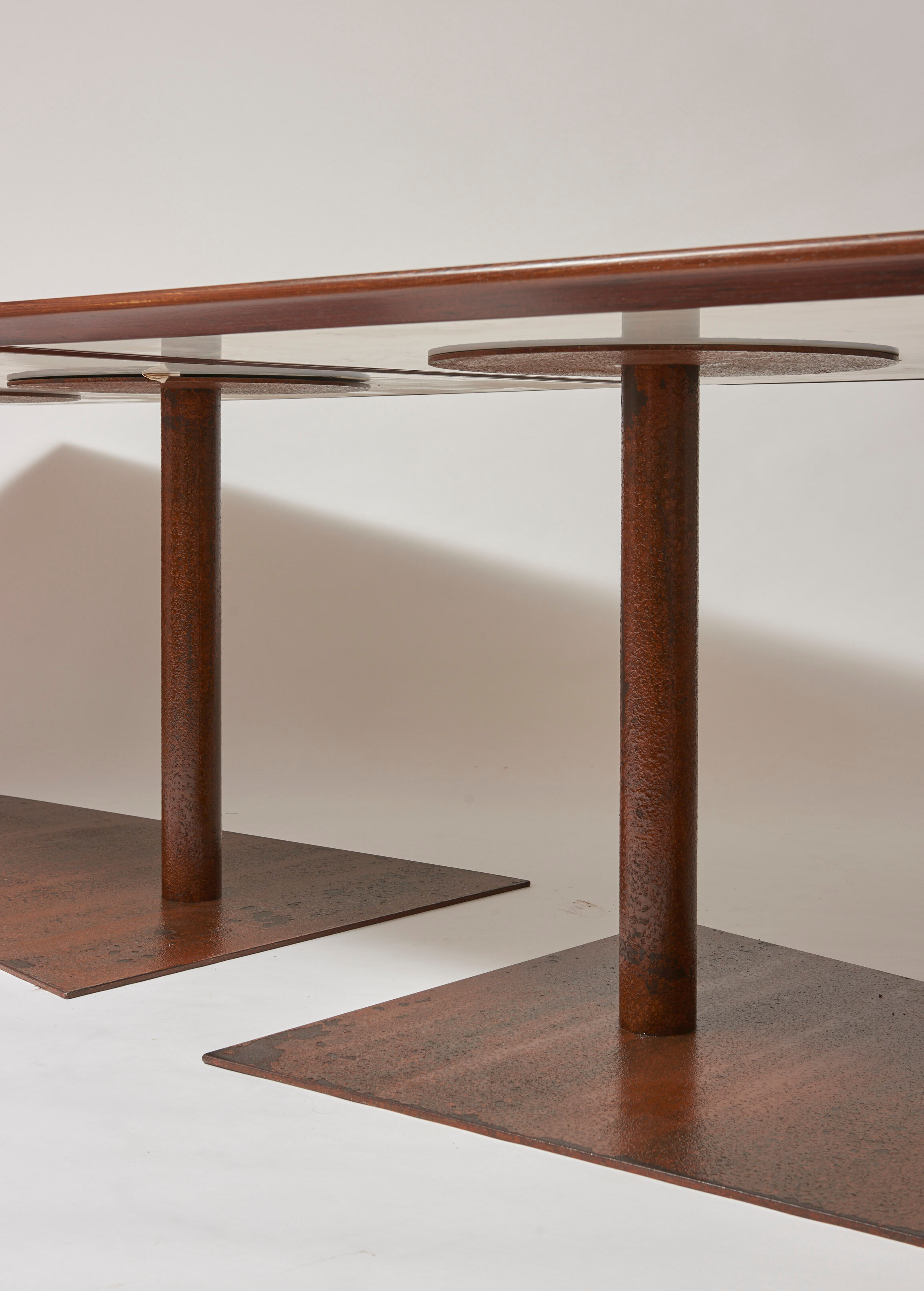 Brutalist conference table made of wood and steel