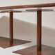 Brutalist conference table made of wood and steel
