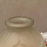 2 semi-opaque glass vases with relief bird designs.