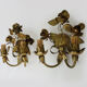 Pair of gilded metal sconces decorated with flowers and foliage. Year 60