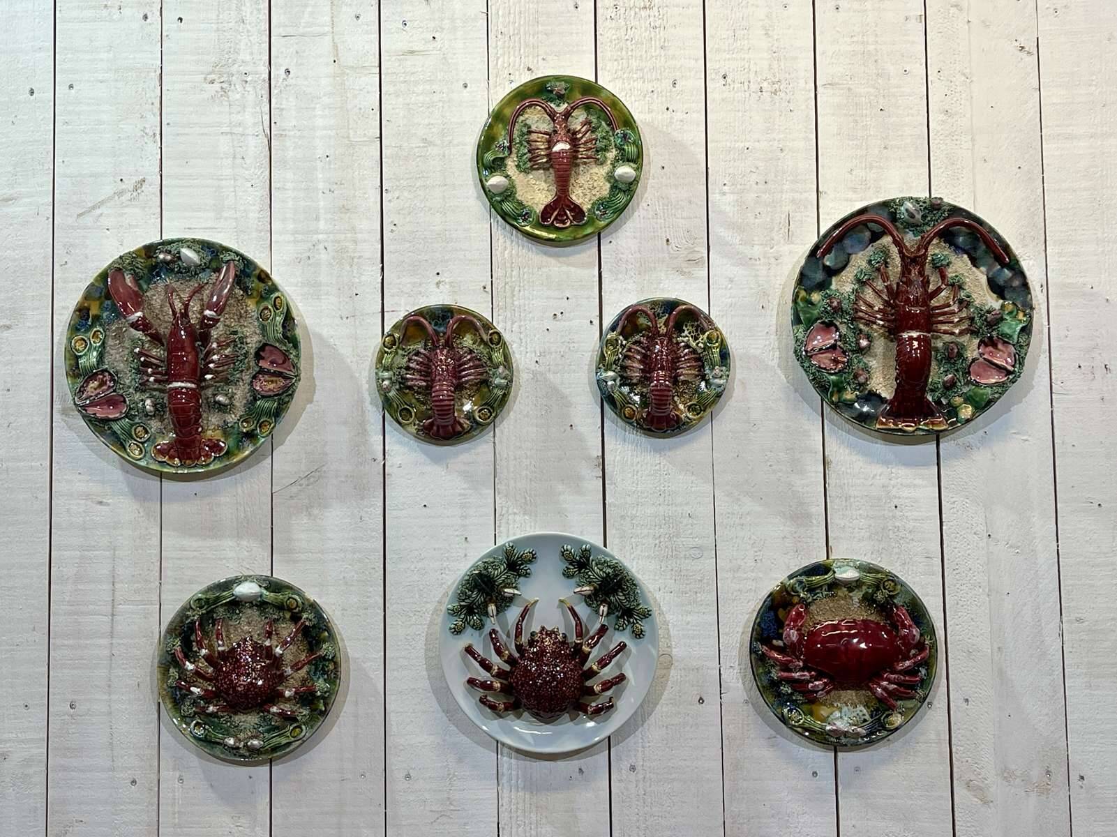 Set of 8 majolica-barbotine dishes and plates
