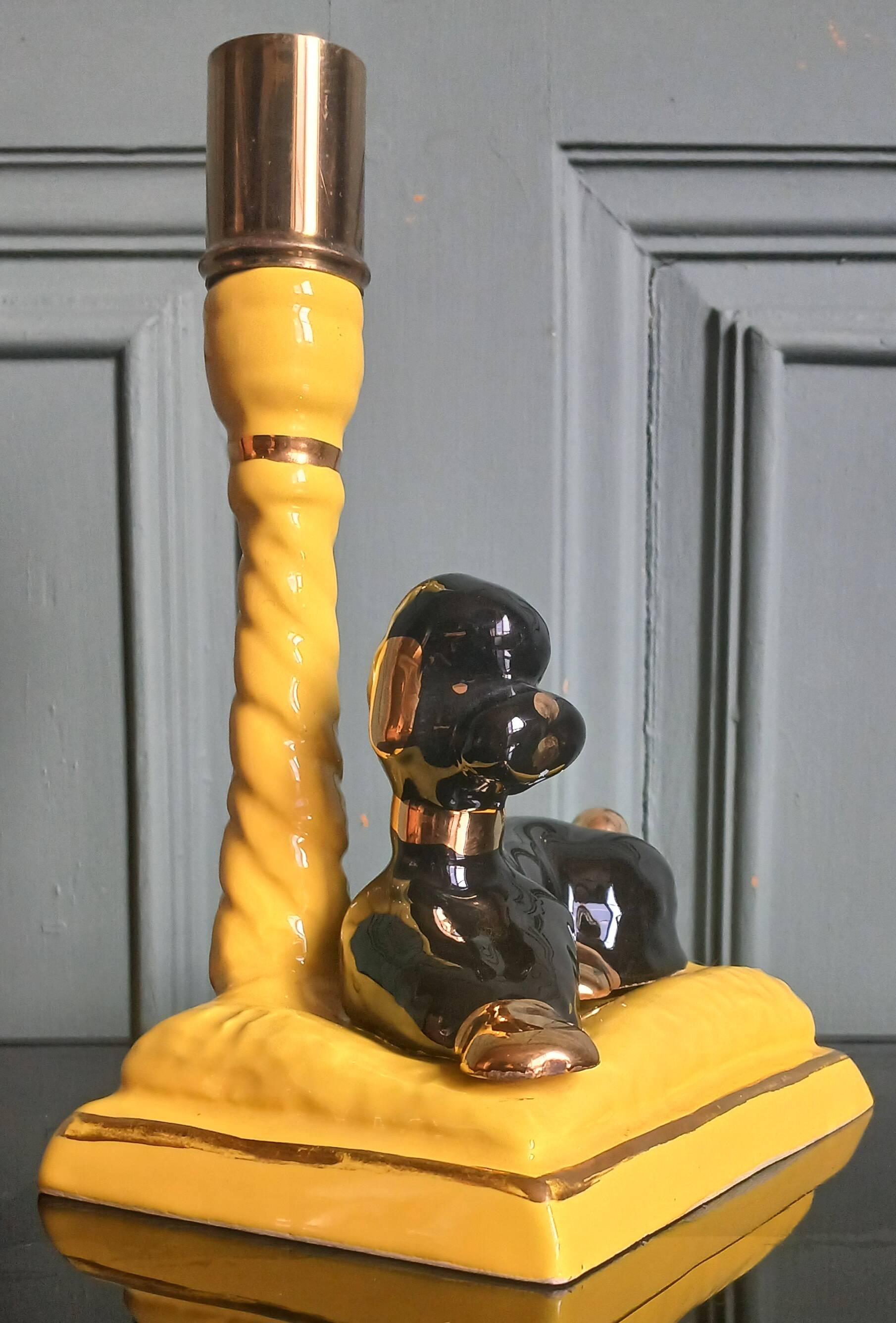 Zoomorphic lamp "poodle" in black, yellow, and gold glazed ceramic.