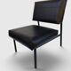 Modernist armchair in black faux leather and metal – 1960s