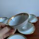 6 cups and golden porcelain saucers