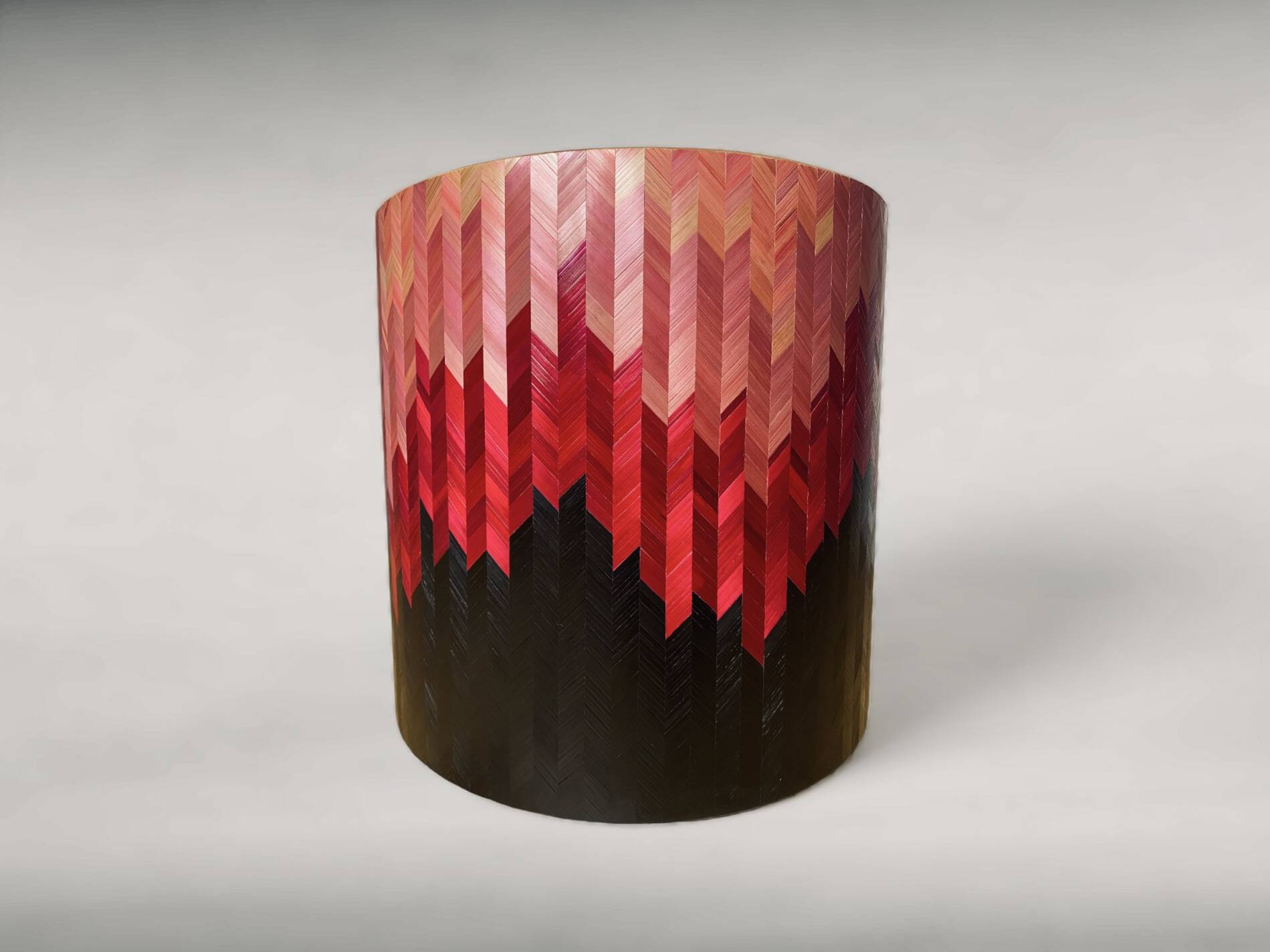 Side table with straw/inlaid concrete.