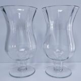Pair of tall clear glass candlesticks from the early 20th century