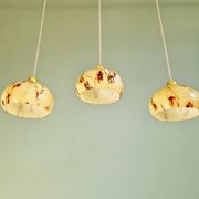 Trio of Art Deco pendant lights in marbled opaline glass, 1920s-30s