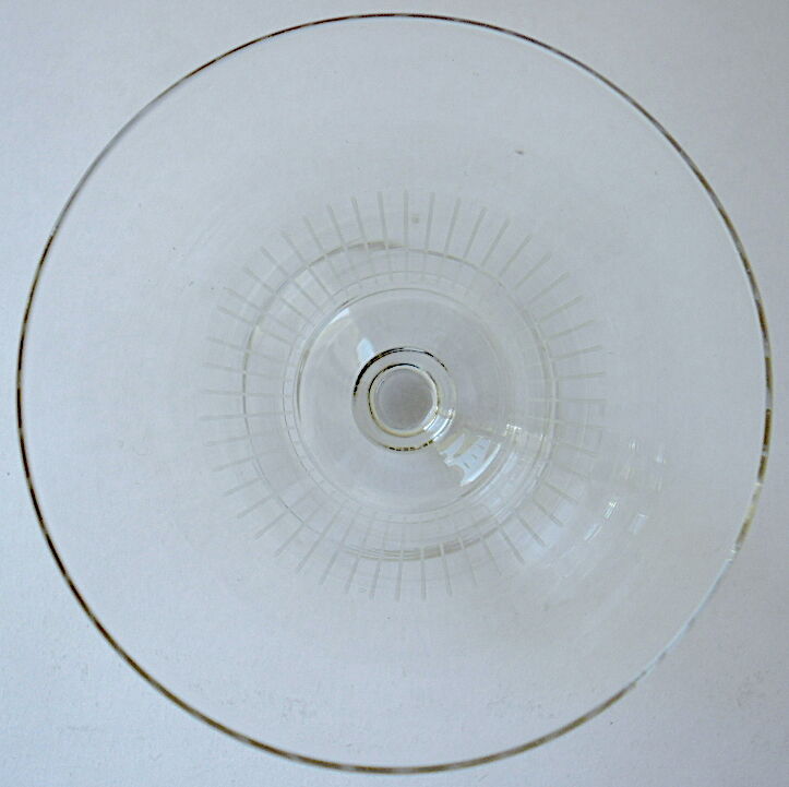 Suite of six art-deco glasses with red wine in modernist shape in cut crystal