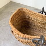 Magazine rack or log rack in straw with brutalist base from the 50s