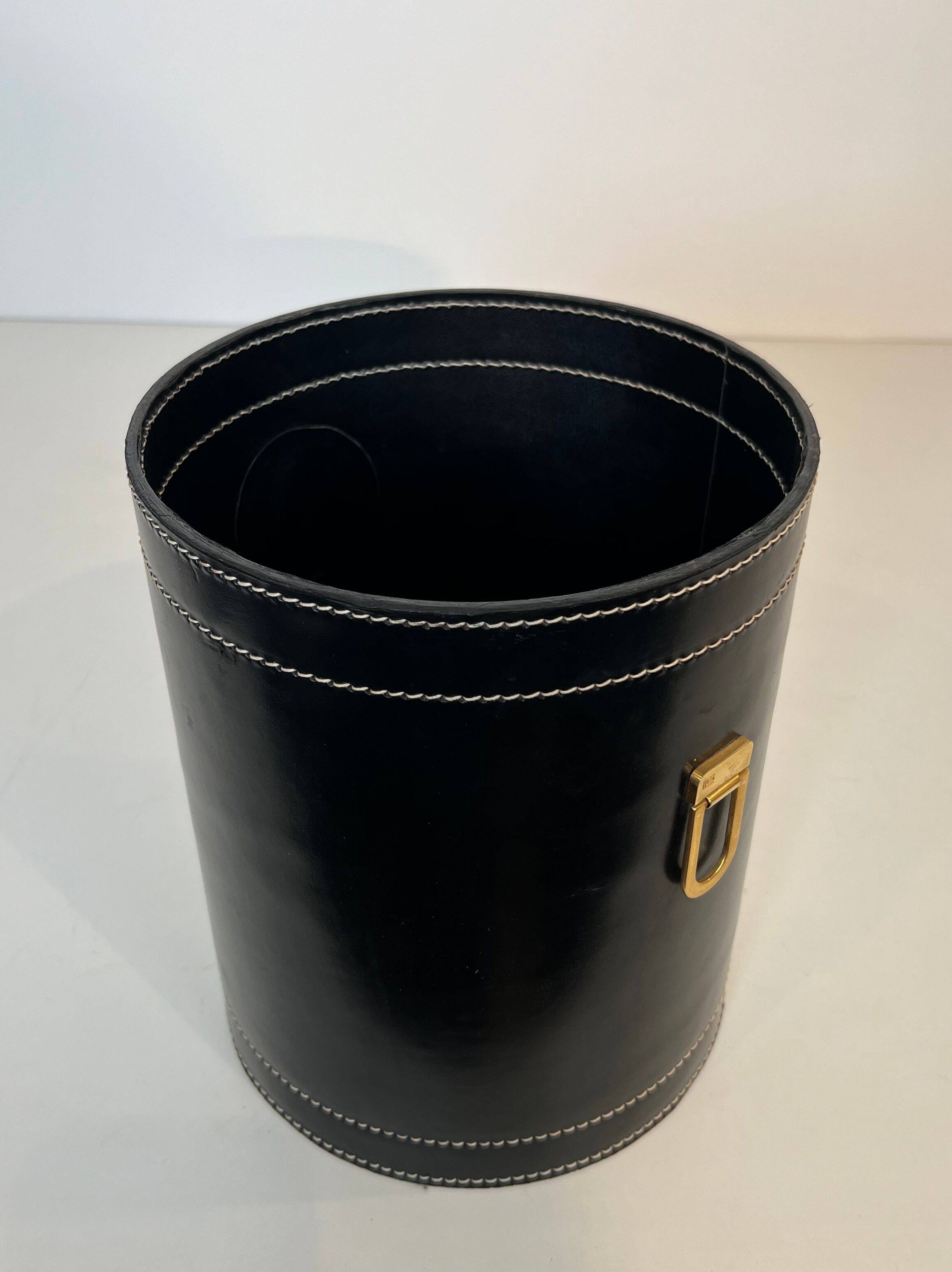 Black leather and brass desk basket
