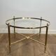 Neoclassical Round Coffee Table in Brass with Fluted Supports and Floral Motifs