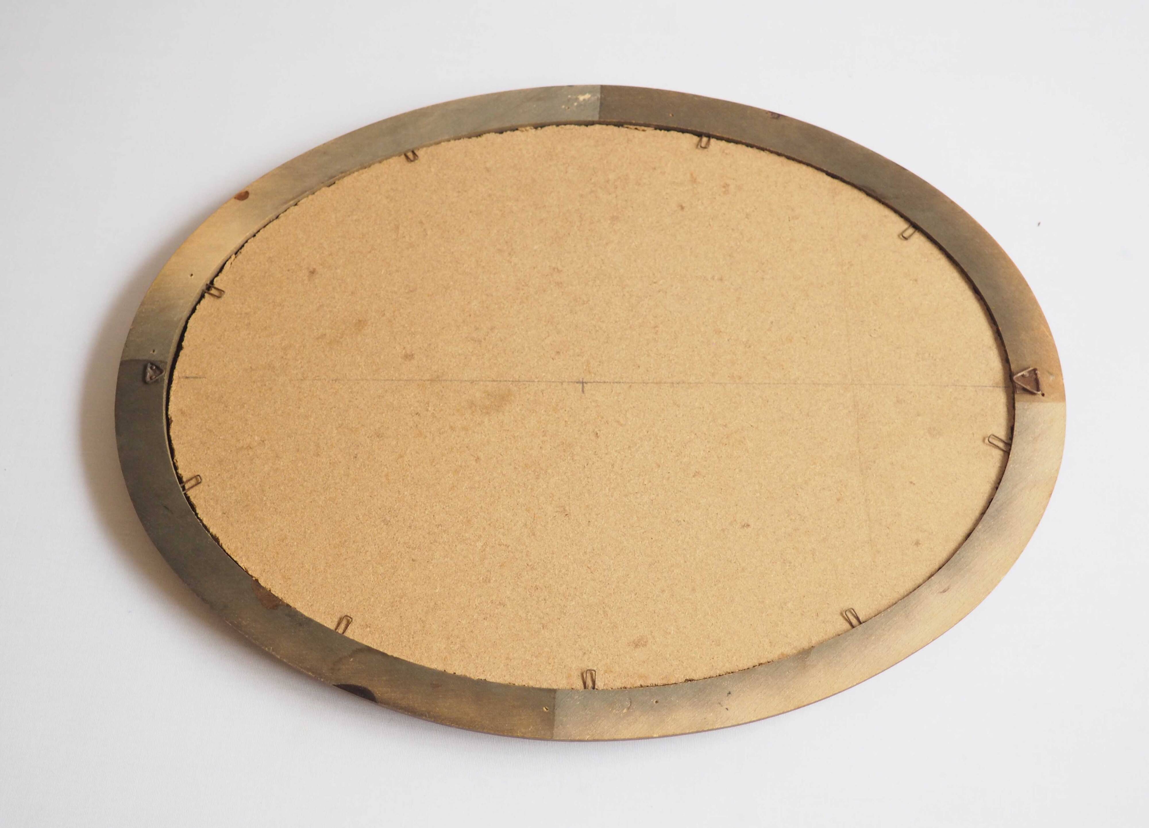 Oval mirror with wooden frame