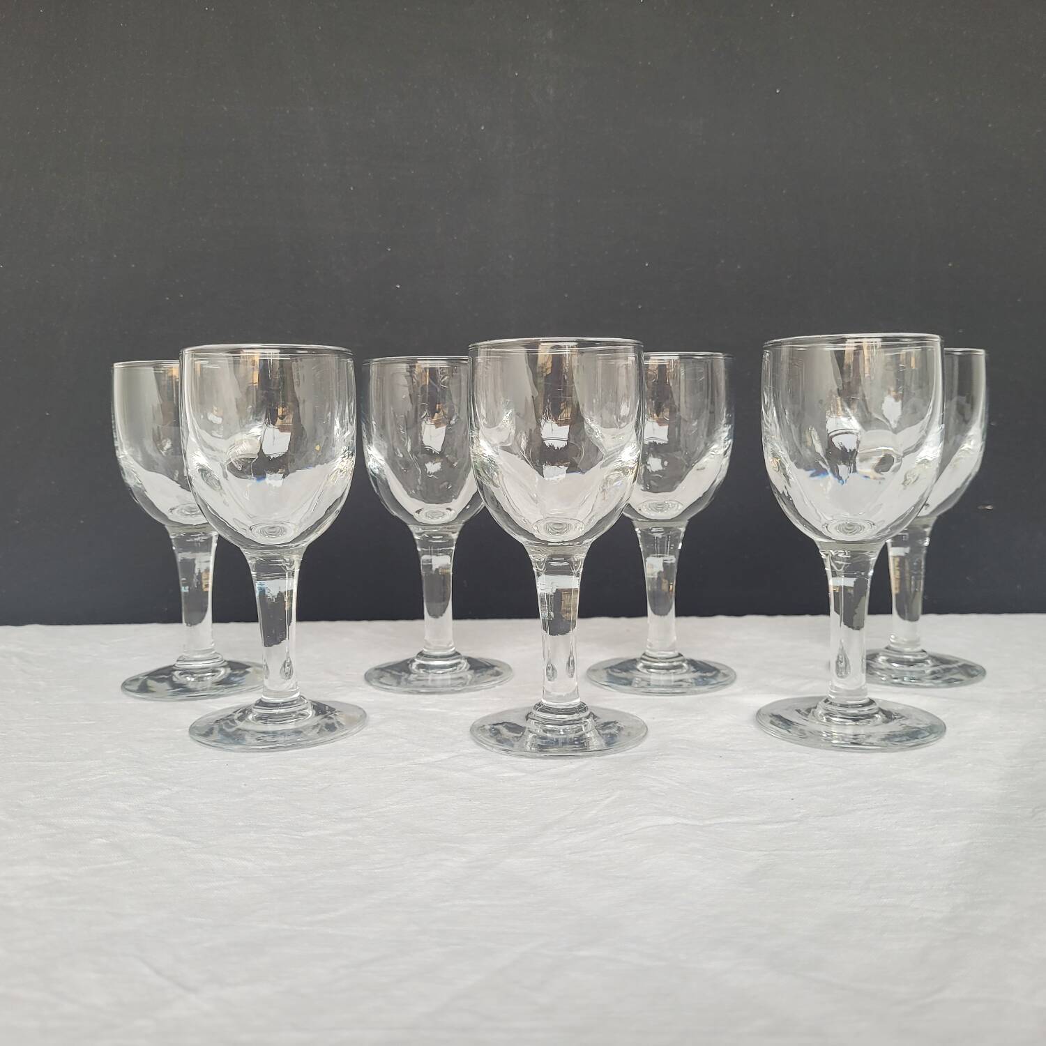 7 antique stemmed glasses made of blown glass – 1930s–1950s