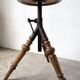 Tripod workshop stool in turned wood and cast iron — circa 1900