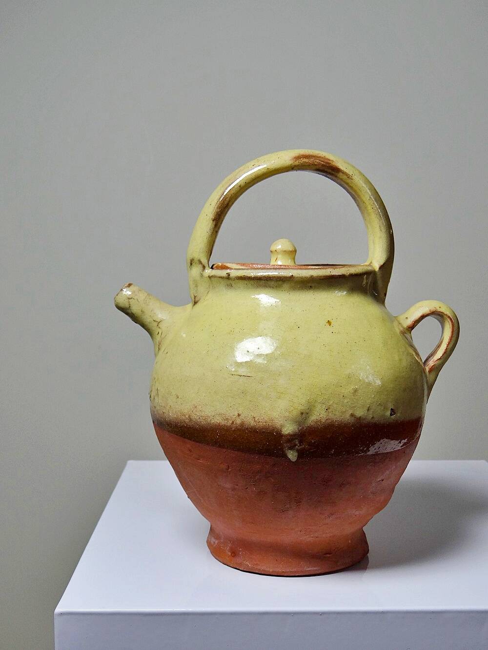 Small vintage pale yellow enamelled terracotta goat jug
