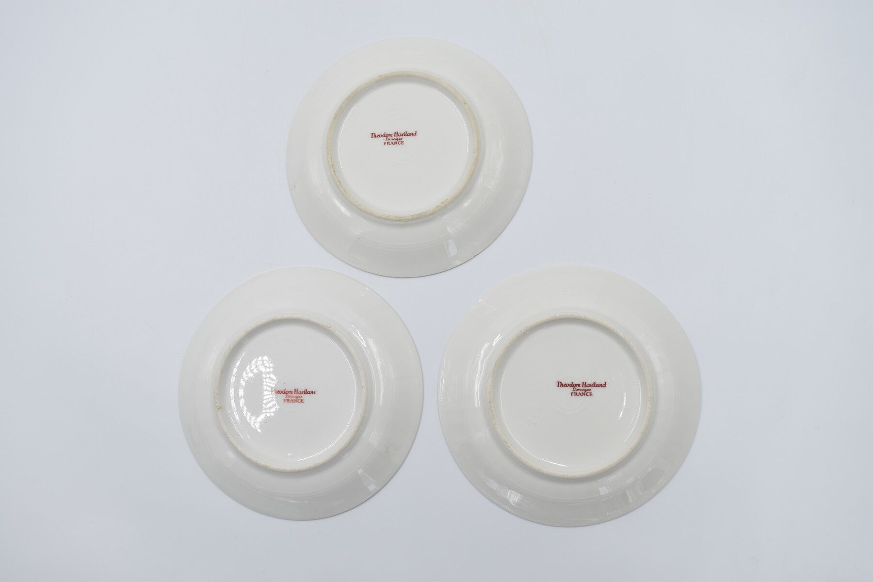 Three cups and under porcelain tea cups from Limoges Haviland barbed-wire décor