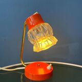 Small orange desk lamp with clear crystal glass shade